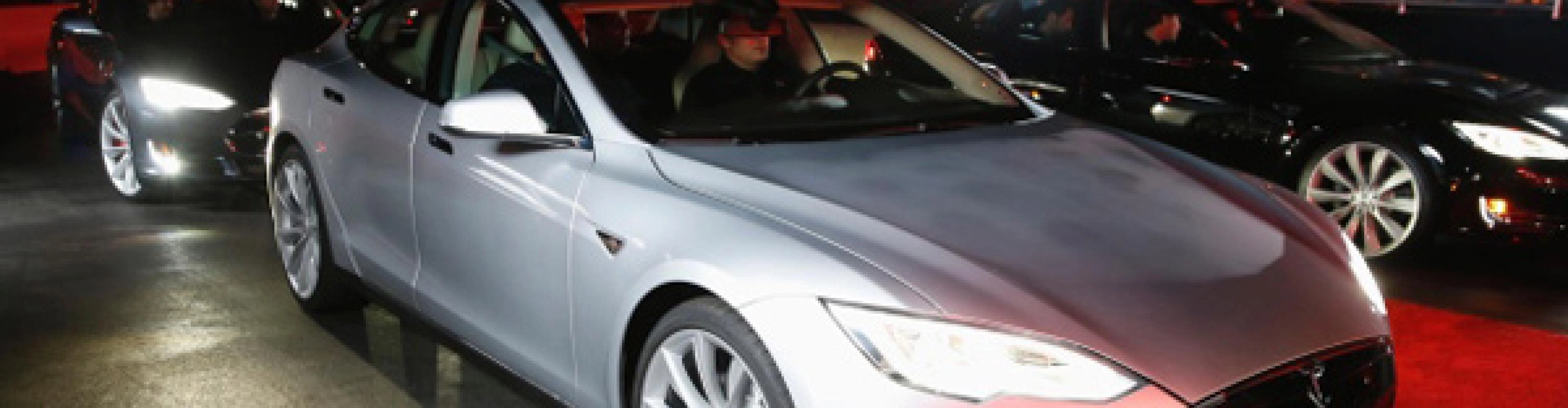 Tesla reveals the dual motor and four wheel drive Tesla P85D EV