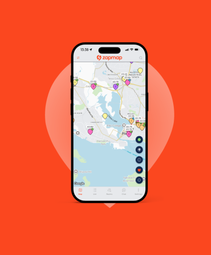 A phone displaying the Zapmap app, showing a map of nearby EV chargers