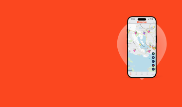 A phone displaying the Zapmap app, showing a map of nearby EV chargers