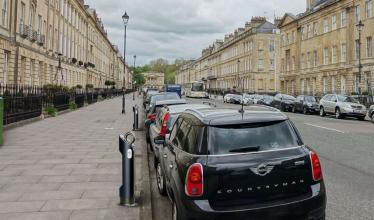 Black EV charging using an on-street charge point