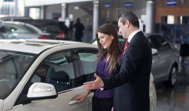 Car buyer with sales person